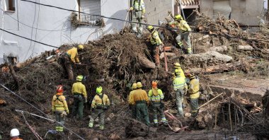 Rescuers search for missing people among debris brought by the floods in Letur, in the province of Albacete, Spain, Oct. 30, 2024. (EPA Photo)