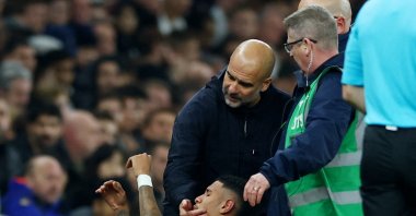 Manchester City's Savinho is carried away on a stretcher after sustaining an injury as Manchester City manager Pep Guardiola looks on during the Carabao Cup Round of 16 match against Tottenham Hotspur at the Tottenham Hotspur Stadium, London, U.K., Oct. 30, 2024. (Reuters Photo)