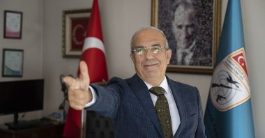Turkish Shooting Federation President Murat Kocakaya shows off the "Yusuf Dikeç pose", Istanbul, Türkiye, Oct. 30, 2024. (AA Photo)