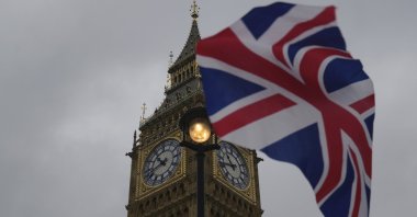 A Union flag is displayed outside the Houses of Parliament, in London, May 23, 2024. (AP Photo)