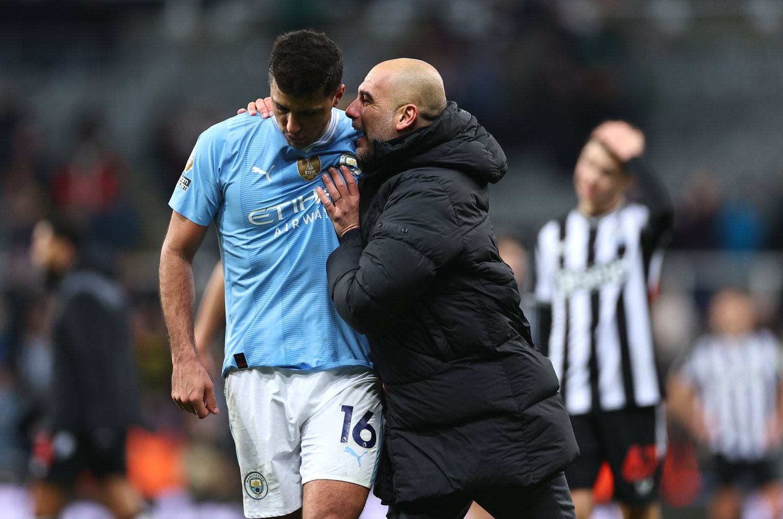 Rodri (L) celebrates his team&#039;s 2-3 victory with Pep Guardiola, the head coach of Manchester City, during the Premier League match between Newcastle United and Manchester City at St. James Park, Newcastle upon Tyne, U.K., Jan. 13, 2024. (Getty Images Photo)