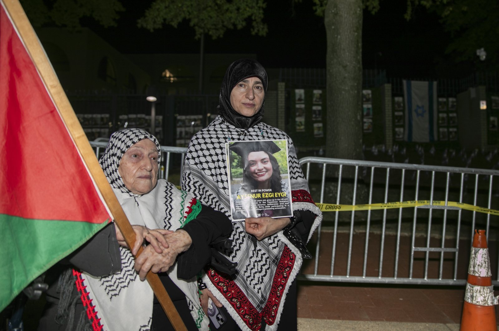 A person holds an image of Turkish-American human rights activist Ayşenur Ezgi Eygi during a pro-Palestinian rally in front of the Israeli Embassy in Washington D.C., U.S., Sept. 14, 2024. (Reuters Photo)