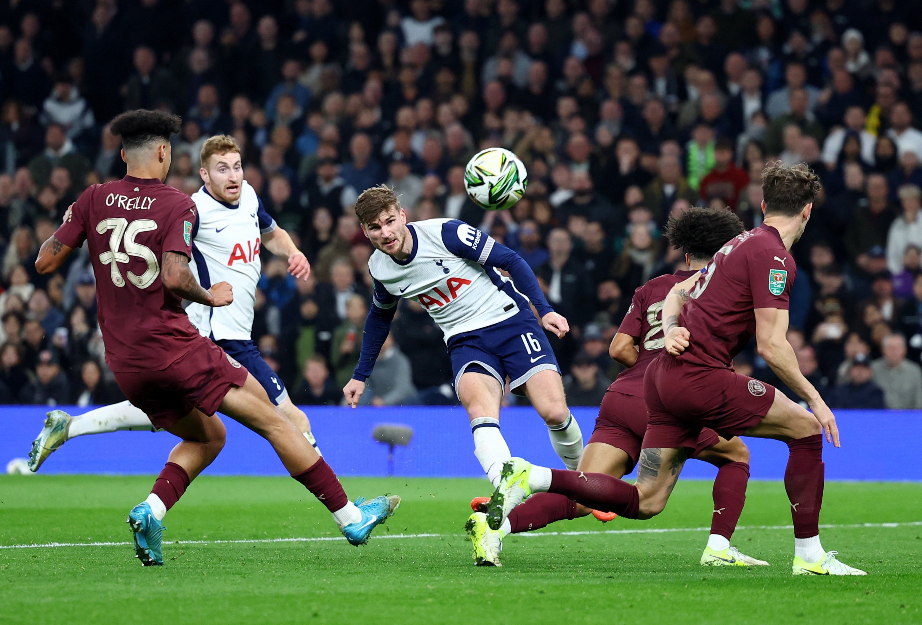 Tottenham Hotspur&#039;s Timo Werner (C) shoots at goal during the Carabao Cup Round of 16 match against Manchester City at the Tottenham Hotspur Stadium, London, U.K., Oct. 30, 2024. (Reuters Photo) 