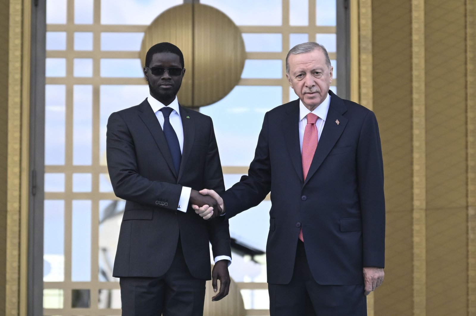 President Recep Tayyip Erdoğan shakes hands with his Senegalese counterpart Bassirou Diomaye Faye ahead of a meeting, Ankara, Türkiye, Oct. 31, 2024. (AA Photo)