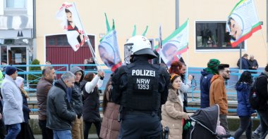 A police officer secures a demonstration of PKK terrorist sympathizers demanding the release of the PKK&#039;s imprisoned ringleader Abdullah Öcalan, Cologne, Germany, Feb. 17, 2024. (Reuters Photo)