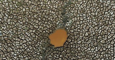 A drone view shows the dry bed of Rio Negro as the river reached its lowest point in its history during the most intense drought, Manaus, Brazil, Oct. 9, 2024. (Reuters Photo)