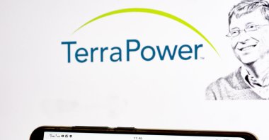 In this photo illustration, the TerraPower logo is seen displayed on a smartphone and in the background, Ukraine, May 25, 2021. (Reuters Photo)