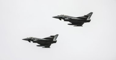 Italian Eurofighters fly over during an inauguration ceremony at an airbase in Kocuve, south of Tirana, Albania, March 4, 2024. (AP Photo)