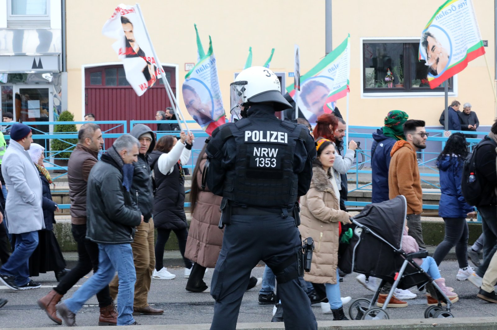 A police officer secures a demonstration of PKK terrorist sympathizers demanding the release of the PKK&#039;s imprisoned ringleader Abdullah Öcalan, Cologne, Germany, Feb. 17, 2024. (Reuters Photo)