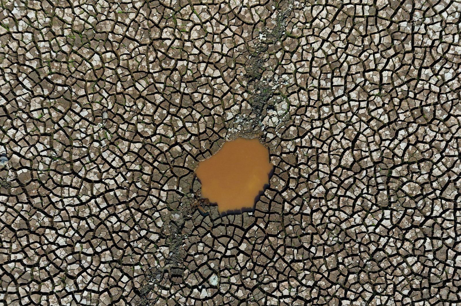 A drone view shows the dry bed of Rio Negro as the river reached its lowest point in its history during the most intense drought, Manaus, Brazil, Oct. 9, 2024. (Reuters Photo)