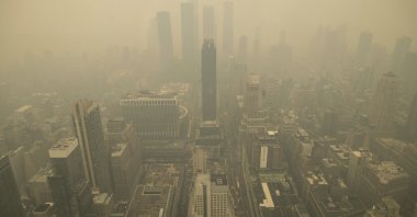 An aerial view shows New York City in a haze-filled sky from the Empire State Building observatory, New York, U.S., June 7, 2023. (AP Photo)