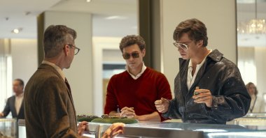 This image released by Netflix shows Cooper Koch as Erik Menendez (C) and Nicholas Chavez as Lyle Menendez (R) in a scene from &quot;Monsters: The Lyle And Erik Menendez Story.&quot; (AP Photo)