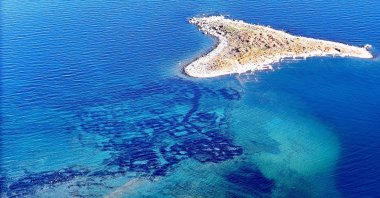Drone footage captures the remnants of an ancient city&#039;s urban layout submerged in Lake Van, Türkiye, Nov. 3, 2024. (IHA Photo) 