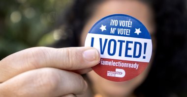 A person shows an "I voted" sticker after she cast her vote at the Palmetto Bay library in the early voting for the 2024 US presidential election in Miami, Florida, U.S., Oct. 29, 2024. (EPA Photo)