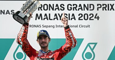 Ducati Lenovo Team&#039;s Italian rider Francesco Bagnaia celebrates his Malaysian MotoGP win, in Sepang, Malaysia, Nov. 3, 2024. (AFP Photo)