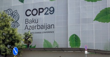 Branding for the COP29 climate conference covers the facade of a building under renovation in Baku, Azerbaijan, Sept. 11, 2024. (AFP Photo)