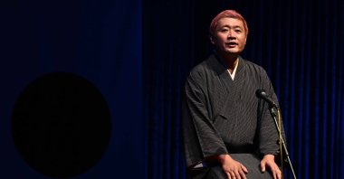Shinoharu Tatekawa, a seasoned performer and storyteller, takes the stage to share a Rakugo performance, Ankara, Türkiye, Nov. 1, 2024. (AA Photo)
