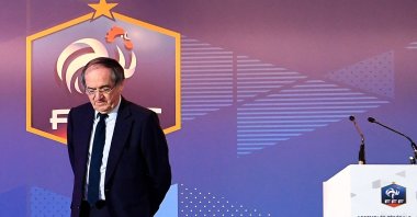 File photo of former French Football Federation (FFF) President Noel Le Graet standing on stage after winning the presidency vote, Paris, France, March 18, 2017. (AFP Photo)