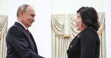In this pool photograph distributed by Russian state agency Sputnik, Russia's President Vladimir Putin (L) greets North Korea's Foreign Minister Choe Son Hui (R) prior to their talks in Moscow, Nov. 4, 2024. (AFP Photo)