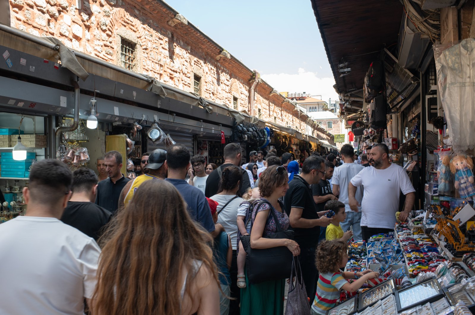 Local shoppers, pedestrians and tourists walk through the old bazaar and market areas of the Eminönü neighborhood of Fatih, Istanbul, Türkiye, June 15, 2024. (Reuters Photo)