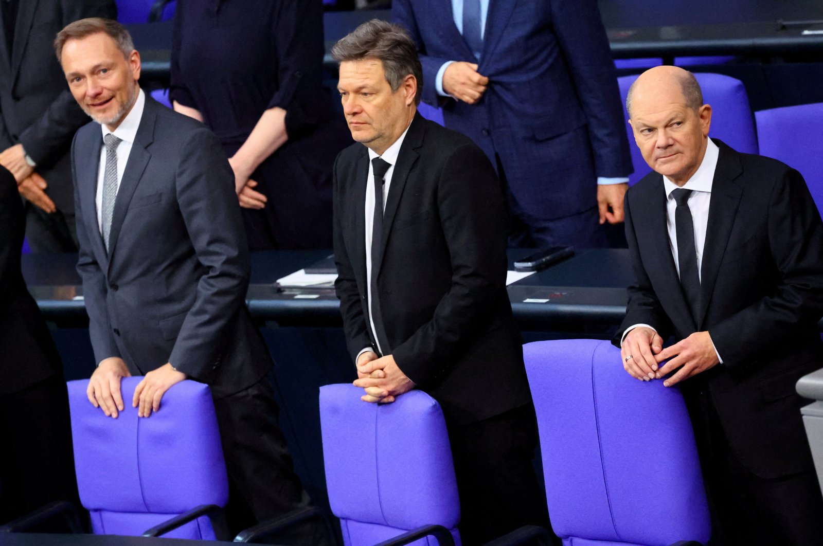 German Finance Minister Christian Lindner (L), Economic Affairs and Climate Action Minister Robert Habeck (C) and Chancellor Olaf Scholz attend the 2024 budget debate session of the German lower house of parliament, the Bundestag, Berlin, Germany, Jan. 31, 2024. (Reuters Photo)