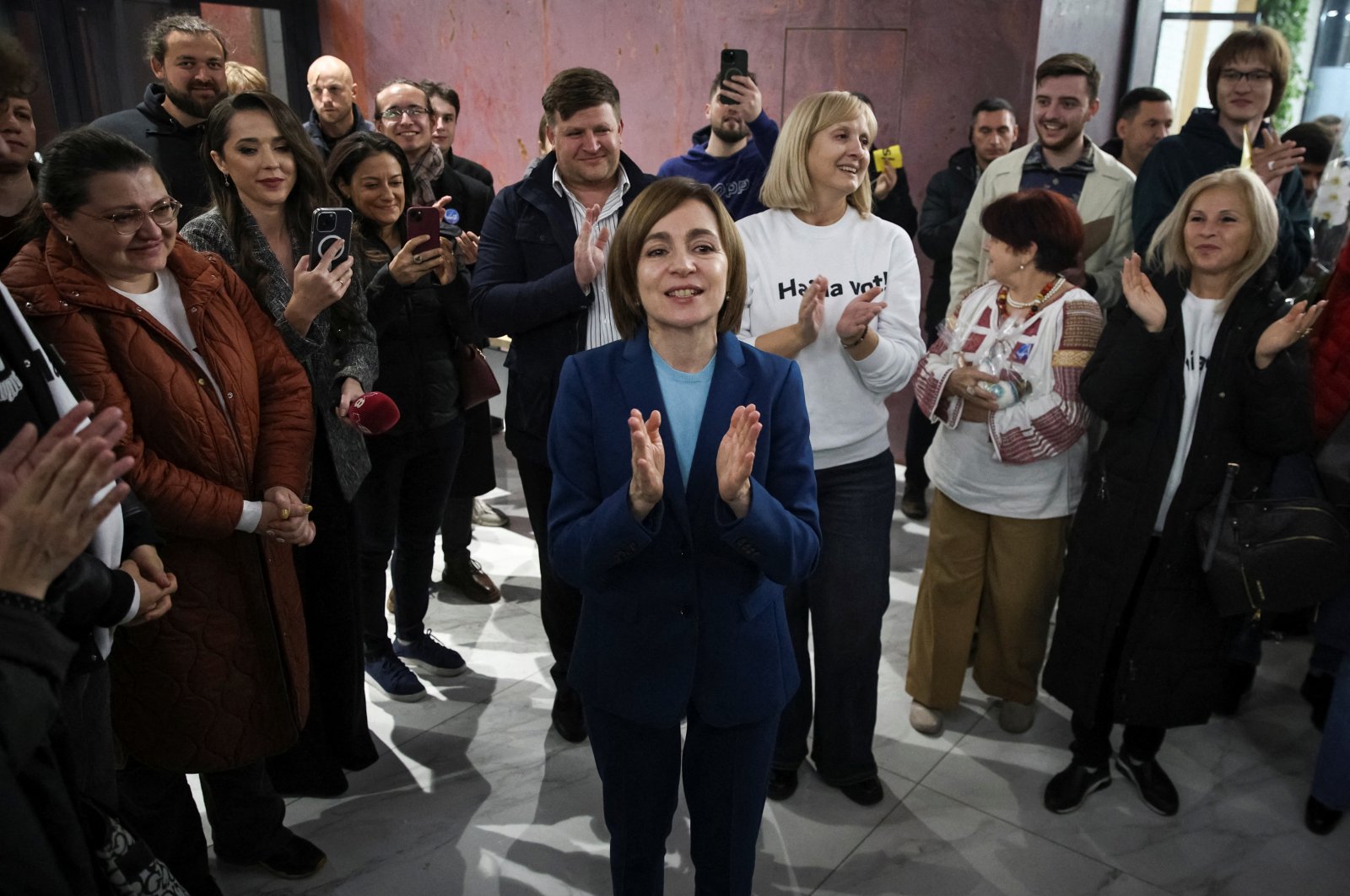 Moldova&#039;s incumbent President and presidential candidate Maia Sandu celebrates with supporters following the announcement of the preliminary results of the second round of the presidential election, at her campaign headquarters in Chisinau, Moldova, Nov. 4, 2024. (Reuters Photo)