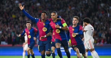 Barcelona's Raphinha (C) celebrates with his teammates Alejandro Balde (L) and Marc Casado after scoring his team's first goal during the UEFA Champions League 2024/25 League Phase MD3 match against Bayern Munchen at Estadi Olimpic Lluis Companys, Barcelona, Spain, Oct. 23, 2024. (Getty Images Photo)