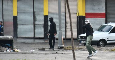 Rioters throw stones at police during a Peoples’ Equality and Democracy Party (DEM Party) gathering, Batman, eastern Türkiye, Nov. 4, 2024. (AA Photo)