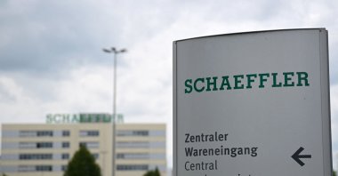 The company's logo is seen on a sign in front of the headquarters of Schaeffler Group, a German rolling equipment bearings maker for automotive, aerospace and industrial uses, Herzogenaurach, Germany, July 3, 2024. (AFP Photo)