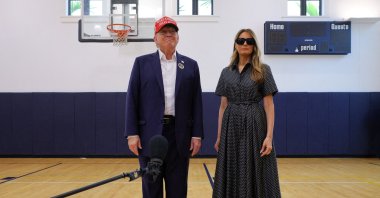 Republican presidential nominee and former U.S. President Donald Trump, accompanied by former U.S. first lady Melania Trump, speaks to reporters as he votes at Mandel Recreation Center on Election Day in Palm Beach, Florida, U.S., Nov. 5, 2024. (Reuters Photo)