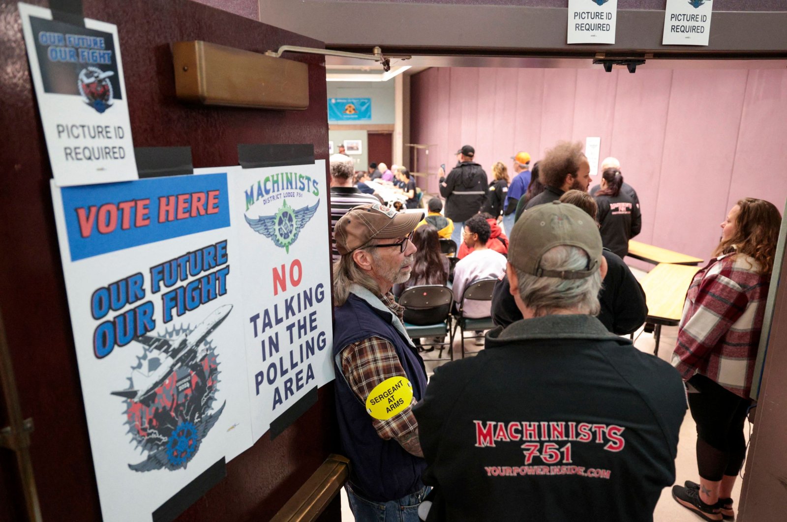 People look on as the Boeing Machinist union tallies votes on the latest Boeing contract offer at the District Lodge 751 Union Hall in Seattle, Washington, U.S., Nov. 4, 2024. (AFP Photo)