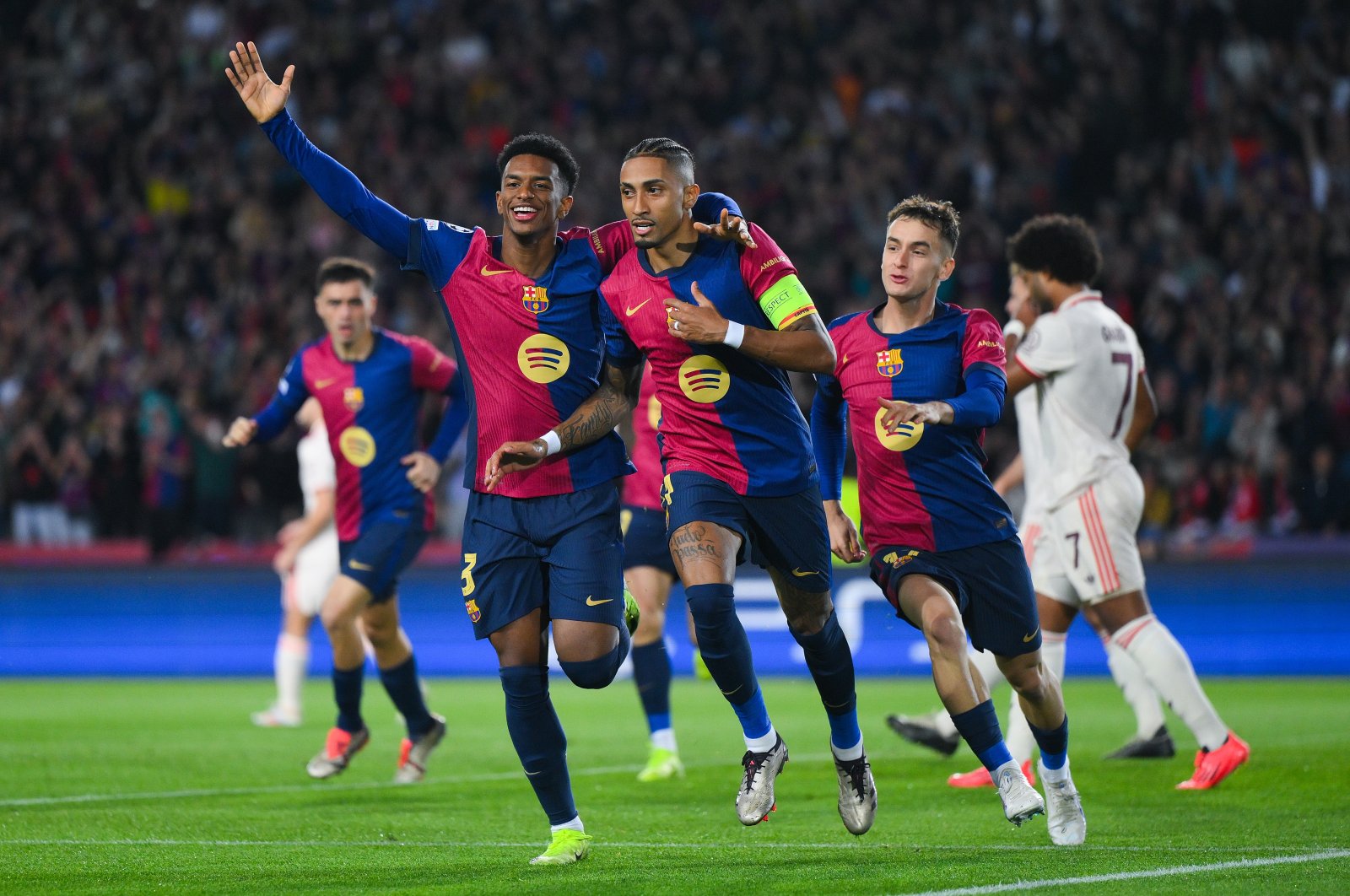 Barcelona&#039;s Raphinha (C) celebrates with his teammates Alejandro Balde (L) and Marc Casado after scoring his team&#039;s first goal during the UEFA Champions League 2024/25 League Phase MD3 match against Bayern Munchen at Estadi Olimpic Lluis Companys, Barcelona, Spain, Oct. 23, 2024. (Getty Images Photo)