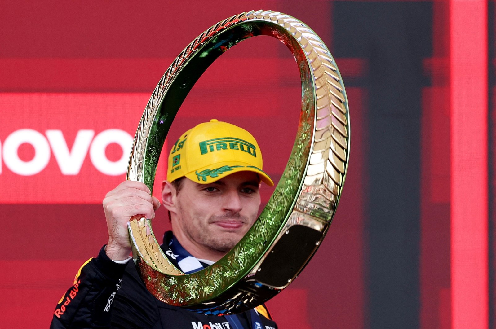 Red Bull&#039;s Max Verstappen celebrates with a trophy on the podium after winning the Sao Paulo Grand Prix at the Autodromo Jose Carlos Pace, Sao Paulo, Brazil, Nov. 3, 2024. (Reuters Photo)