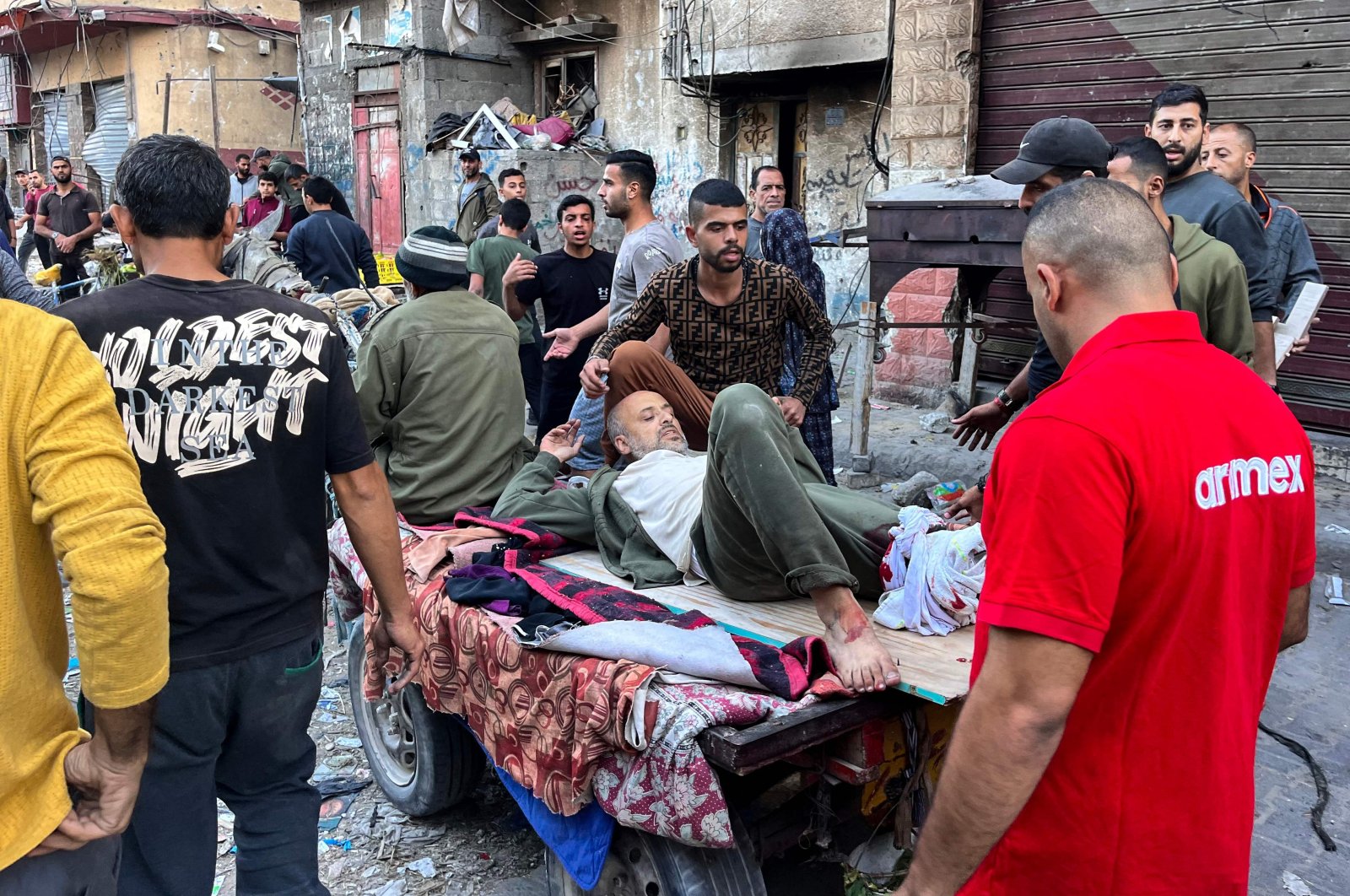 People carry a man injured in Israeli bombardment on Beit Lahia, northern Gaza Strip, Palestine, Nov. 4, 2024. (AFP Photo)