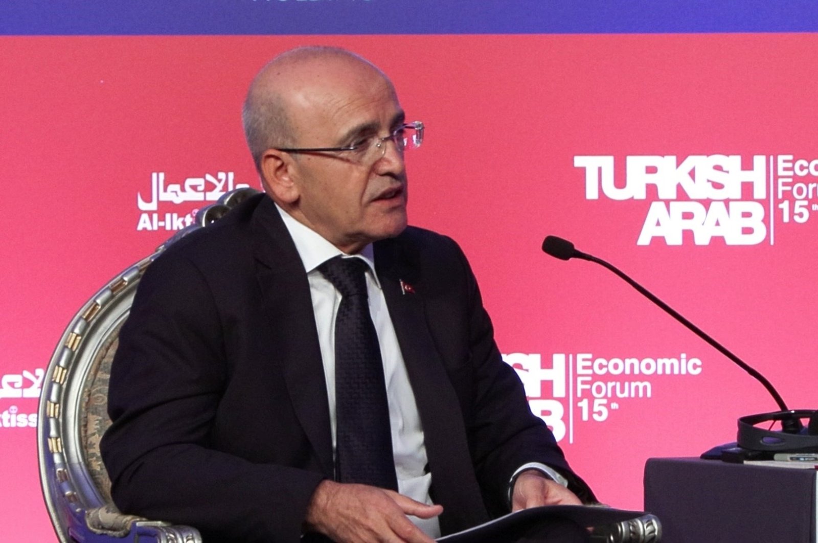 Treasury and Finance Minister Mehmet Şimşek delivers a speech during a forum, Istanbul, Türkiye, Oct. 17, 2024. (DHA Photo)