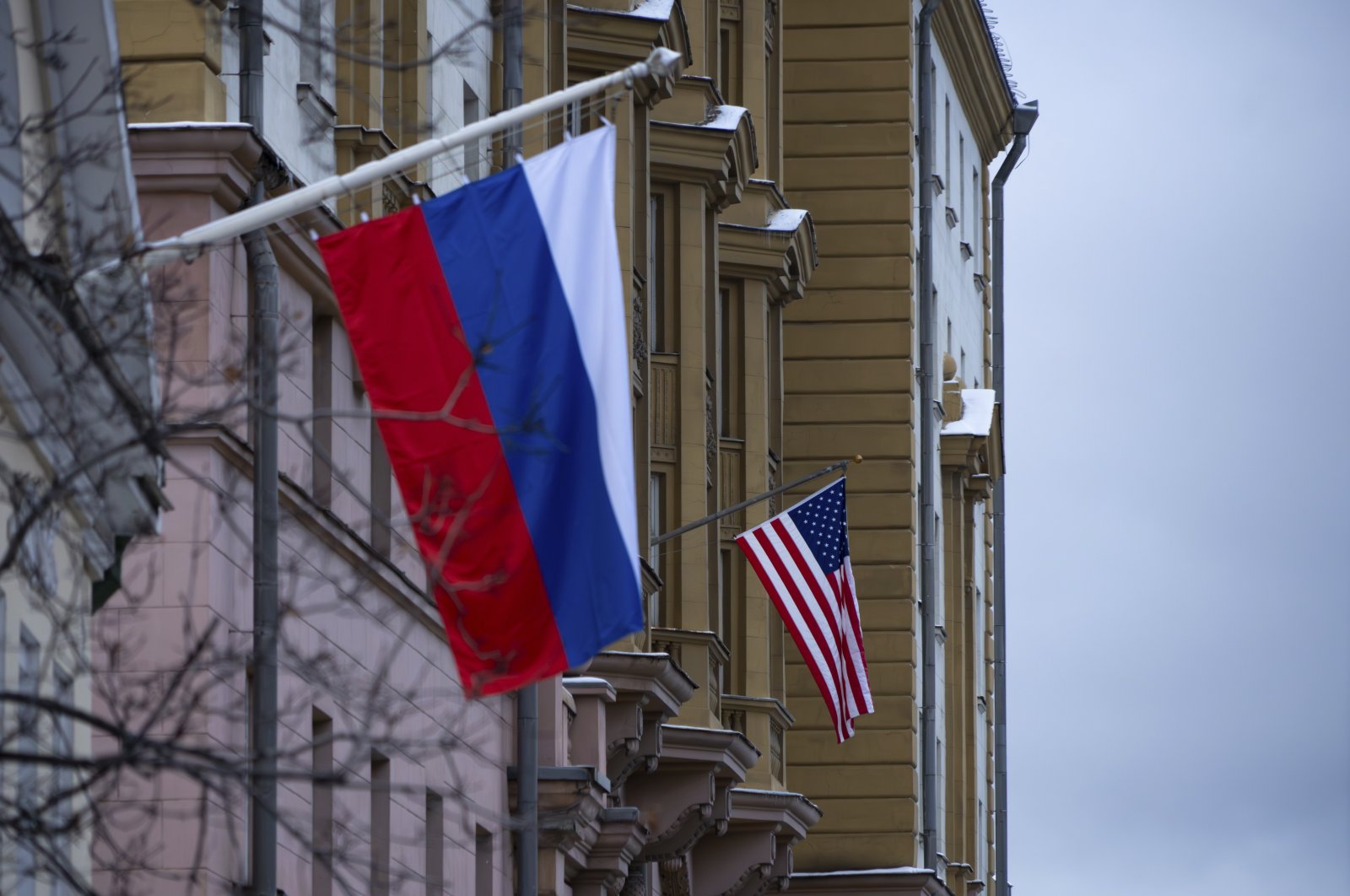 The U.S. Embassy with a U.S. national flag, seen behind a building with a Russian national flag in Moscow, Russia, Tuesday, Nov. 5, 2024. (AP Photo)