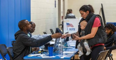 A voter checks in at Bruns Avenue Elementary School in Charlotte, North Carolina, U.S., Nov. 5, 2024. (AFP Photo)