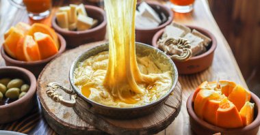 Kuymak, sometimes called muhlama, is a savory cornmeal-based dish made with butter and local cheese varieties like Trabzon’s distinctive kolot cheese, known for its high melting point. (Shutterstock Photo)