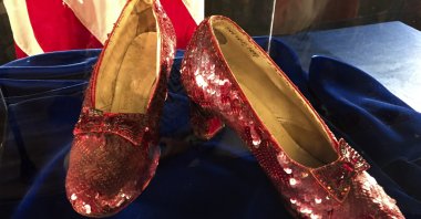 Ruby slippers once worn by Judy Garland in &quot;The Wizard of Oz&quot; are displayed at a news conference at the FBI office in Brooklyn Center, Minnesota, U.S., Sept. 4, 2018. (AP Photo)