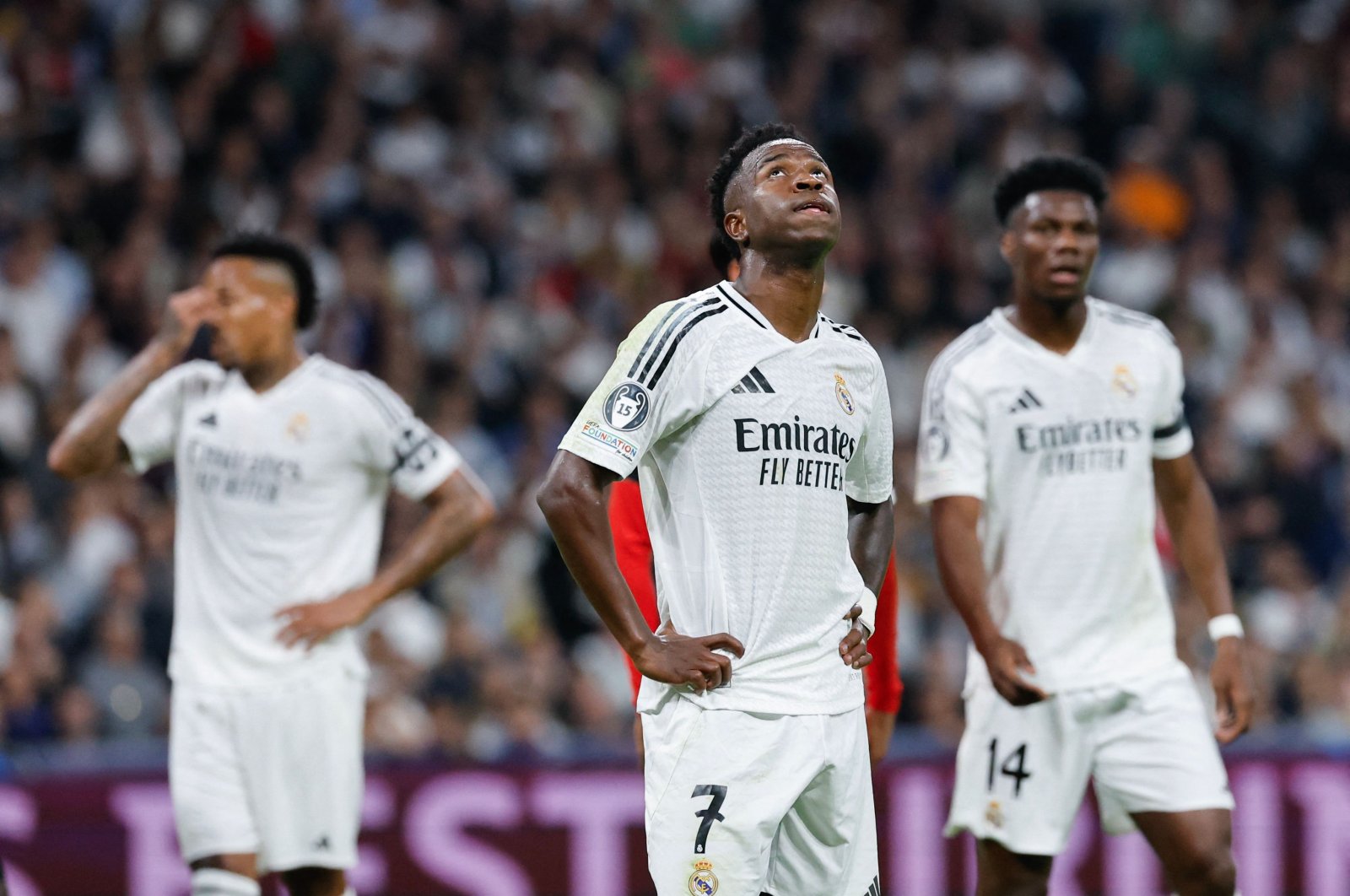 Real Madrid&#039;s Vinicius Junior (C) reacts after AC Milan scored their second goal during the UEFA Champions League, league phase Day 4 football match between Real Madrid CF and AC Milan at the Santiago Bernabeu stadium, Madrid, Spain, Nov. 5, 2024. (AFP Photo)