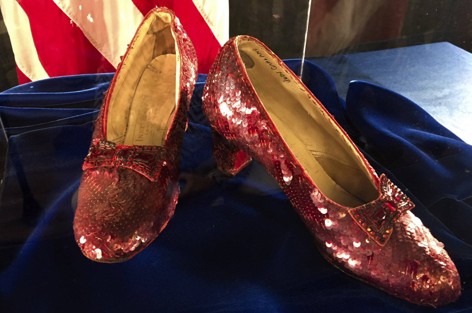 Ruby slippers once worn by Judy Garland in &quot;The Wizard of Oz&quot; are displayed at a news conference at the FBI office in Brooklyn Center, Minnesota, U.S., Sept. 4, 2018. (AP Photo)