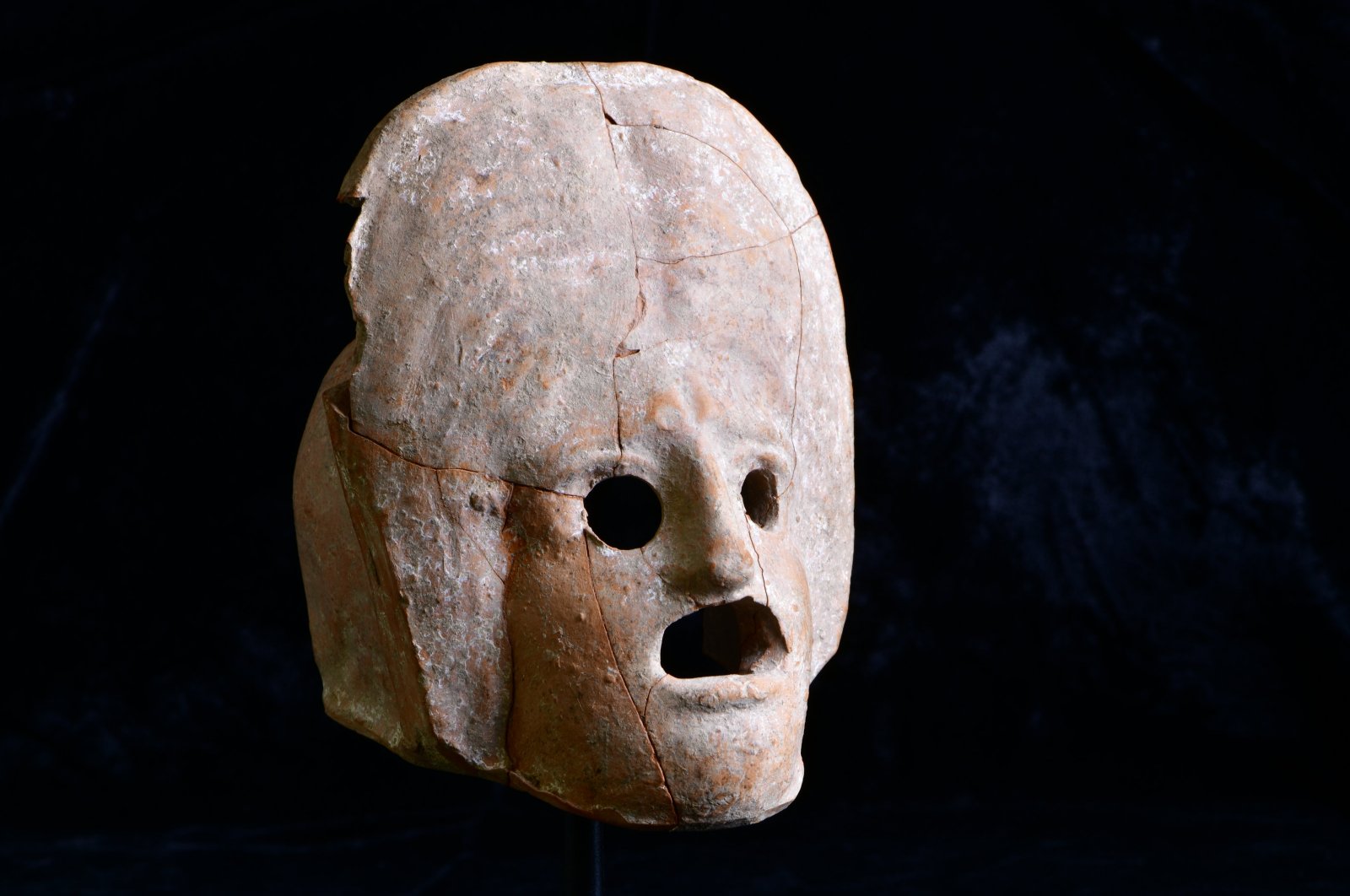 The 2,000-year-old theater mask made of fired clay discovered in Kütahya, Türkiye, Nov. 6, 2024. (AA Photos)