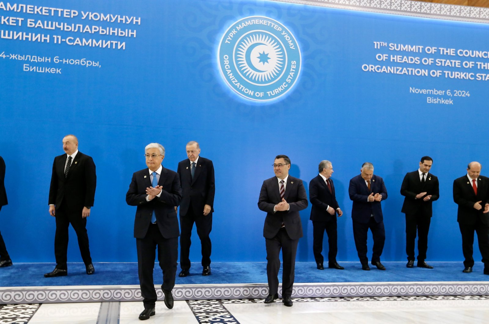 (L-R) Organization of Turkic States (OTS) Secretary-General Kubanychbek Omuraliev, Azerbaijan&#039;s President Ilham Aliyev, Kazakhstan&#039;s President Kassym-Jomart Tokayev, President Recep Tayyip Erdogan, Kyrgyz President Sadyr Japarov, Uzbekistan&#039;s President Shavkat Mirziyoyev, Hungarian Prime Minister Viktor Orban, Ambassador of Turkmenistan to Kyrgyzstan Nury Golliev, and Northern Cyprus (TRNC) President Ersin Tatar gather for a family photo during the 11th Summit of the Heads of State of the OTS, Bishkek, Kyrgyzstan, Nov. 6 2024. (EPA Photo)