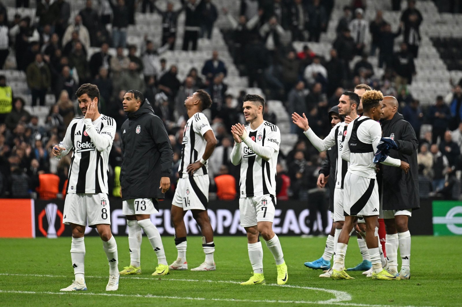 Beşiktaş&#039;s players celebrate at the end of the UEFA Europa League first round, day 4 football match between Beşiktaş JK and Malmo at the Beşiktaş Park Stadium in Istanbul on Nov. 6, 2024. (AFP Photo)