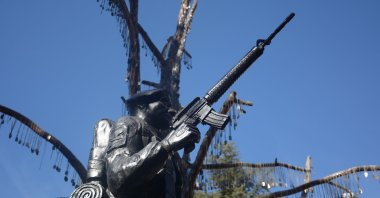 Dog tags with the names of 5 martyrs who died in the TAI attack are hung on Martyrs Memorial Tree in Kızılcahamam, Ankara, Türkiye, Nov. 1, 2024. (IHA Photo)