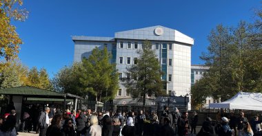 People gather in front of the courthouse as the trial for the murder of Narin Güran begins in Diyarbakır, Türkiye, Nov. 7, 2024. (IHA Photo)