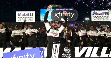 Ryan Blaney, driver of the #12 Discount Tire Ford, celebrates in victory lane after winning the NASCAR Cup Series Xfinity 500 at Martinsville Speedway, Martinsville, Virginia, U.S., Nov. 3, 2024. (AFP Photo)