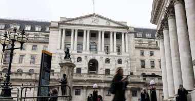 People walk past the Bank of England building ahead of the central bank&#039;s announcement on the decision to increase interest rates, London, Britain, Nov. 7, 2024. (EPA Photo)