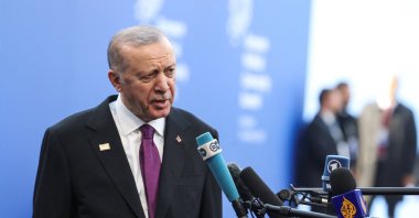 President Recep Tayyip Erdoğan speaks to the media as he attends the European Political Community Summit at the Puskas Arena, in Budapest, Hungary, Nov. 7, 2024. (Reuters Photo)