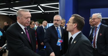President Recep Tayyip Erdoğan and NATO chief Mark Rutte shake hands at the EPC Summit in Budapest, Nov. 7, 2024. (AA Photo)